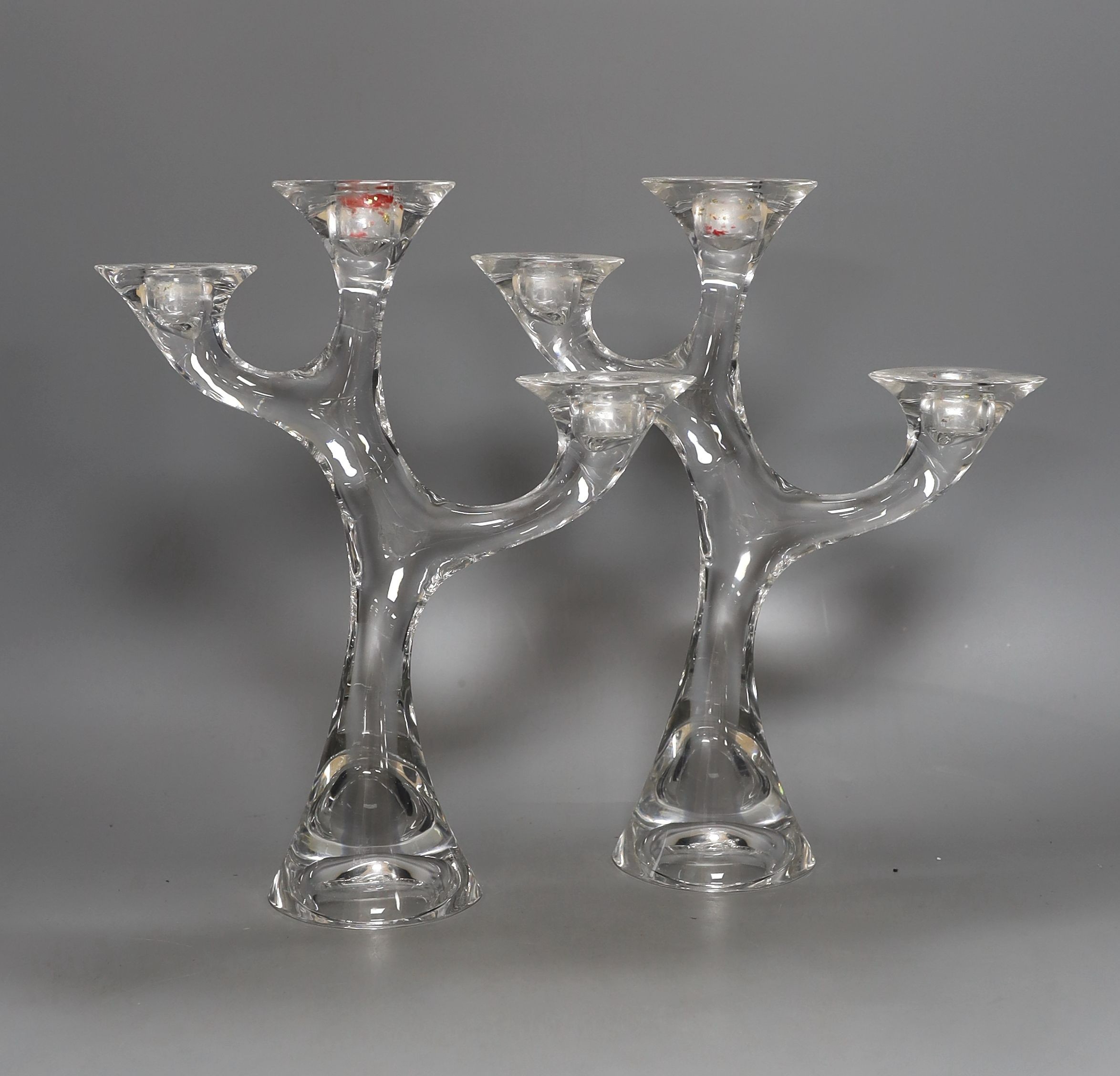 A pair of three branch glass candelabra, signed Marcaurel. 28cm